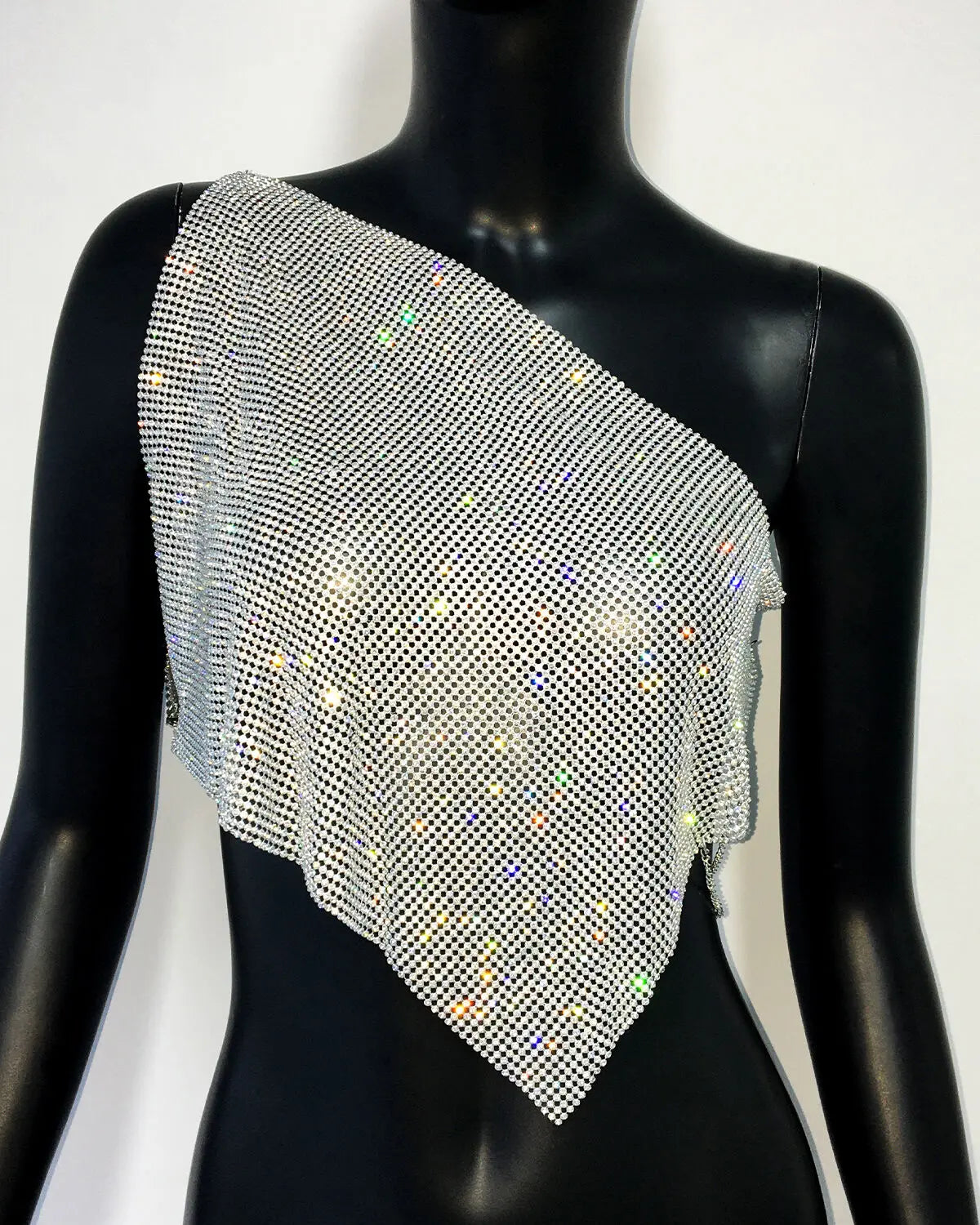 Top Asimétrico con Tirante Único